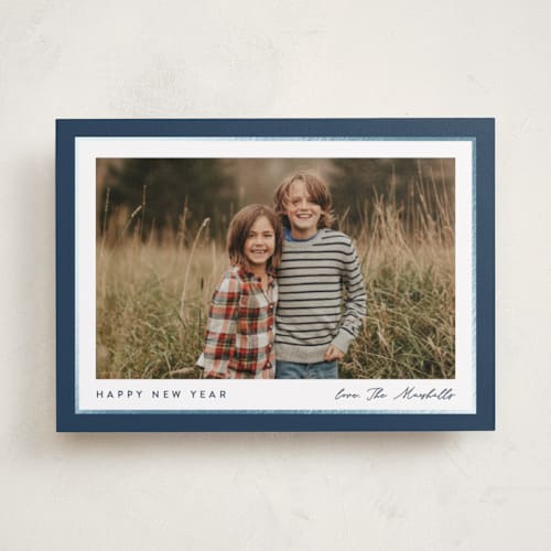 This is a glacier foil pressed holiday cards with foil pressed by Carolyn MacLaren called ribbon frame printing on recycled smooth signature in standard