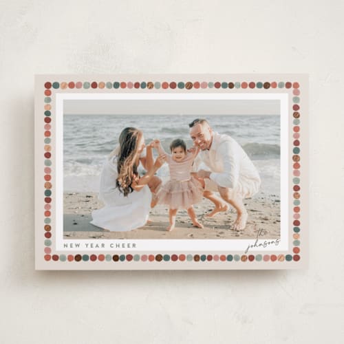 This is a apple cider foil pressed holiday cards with foil pressed by Joanna Griffin called pom pom garland printing on recycled smooth signature in standard
