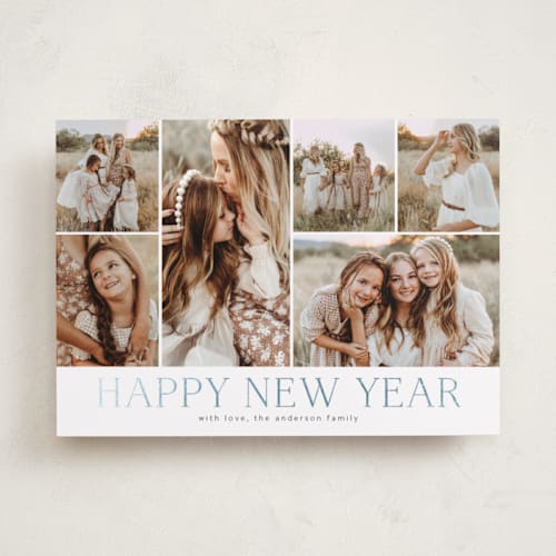 This is a navy foil pressed holiday cards with foil pressed by Kimberly Morgan called holiday photo grid printing on recycled smooth signature in standard