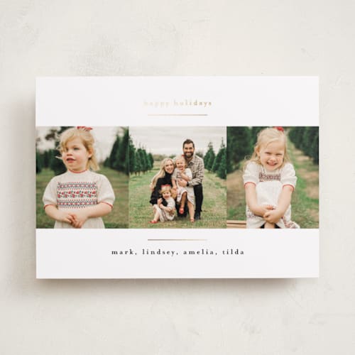 This is a crisp snow foil pressed holiday cards with foil pressed by Kate Ross called modern minimalist printing on recycled smooth signature in standard