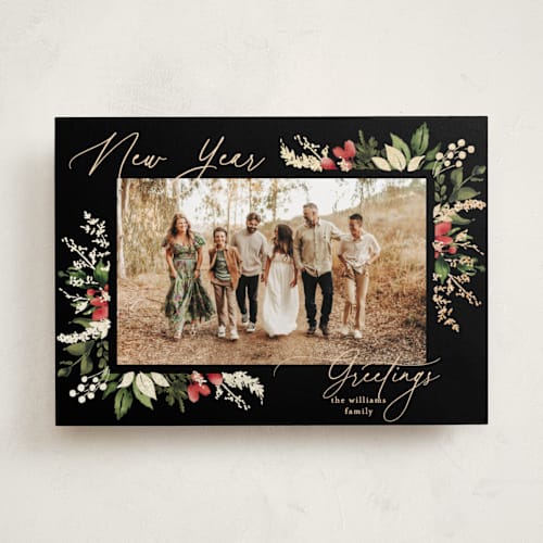 This is a ebony foil pressed holiday cards with foil pressed by Chris Griffith called a sparkle of holiday printing on recycled smooth signature in standard