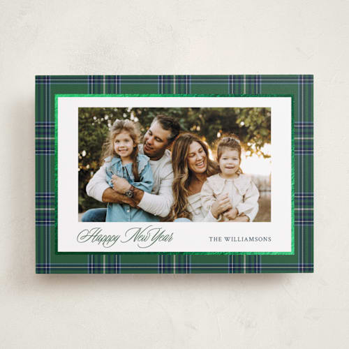 This is a evergreen foil pressed holiday cards with foil pressed by Cindy Reynolds called navy baby printing on recycled smooth signature in standard