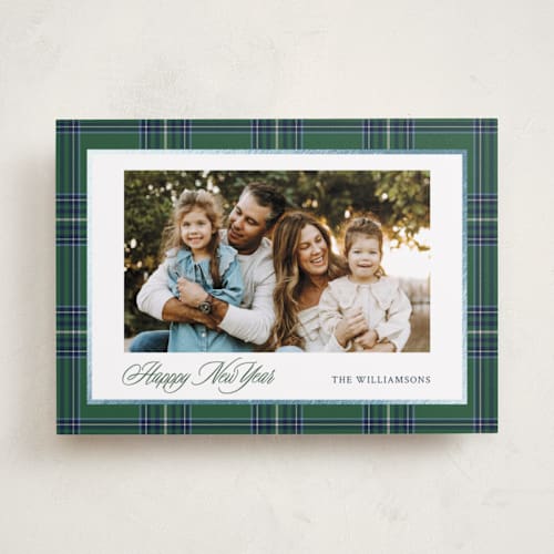 This is a evergreen foil pressed holiday cards with foil pressed by Cindy Reynolds called navy baby printing on recycled smooth signature in standard