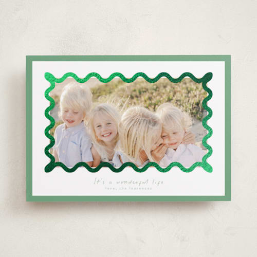 This is a spearmint foil pressed holiday cards with foil pressed by Blustery August called party squiggle printing on recycled smooth signature in standard