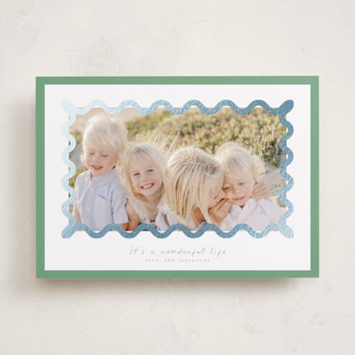 This is a spearmint foil pressed holiday cards with foil pressed by Blustery August called party squiggle printing on recycled smooth signature in standard