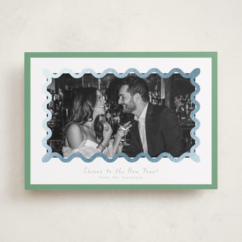 This is a spearmint foil pressed holiday cards with foil pressed by Blustery August called party squiggle printing on recycled smooth signature in standard