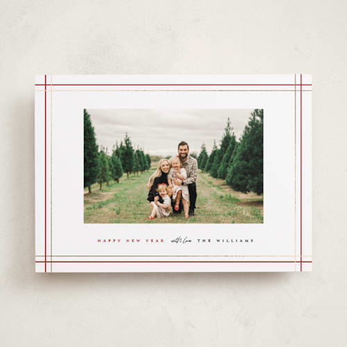 This is a holly foil pressed holiday cards with foil pressed by Pixel and Hank called with love printing on recycled smooth signature in standard