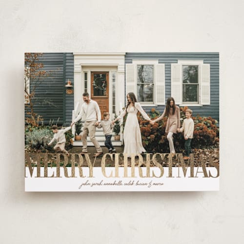 This is a almond foil pressed holiday cards with foil pressed by Kelly Watkins called headline printing on recycled smooth signature in standard