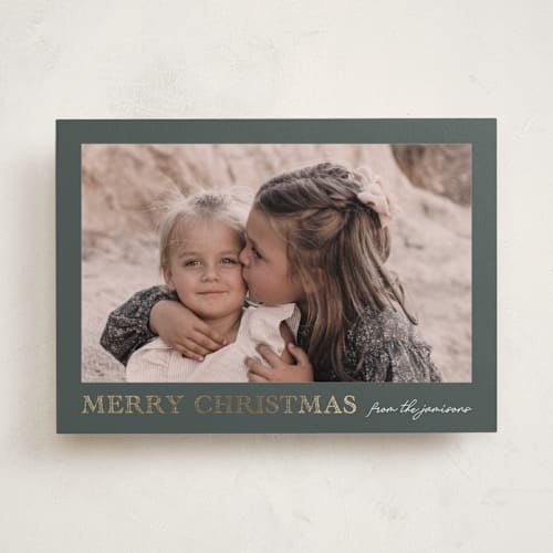 This is a fern foil pressed holiday cards with foil pressed by Chris Griffith called engraved holiday printing on recycled smooth signature in standard