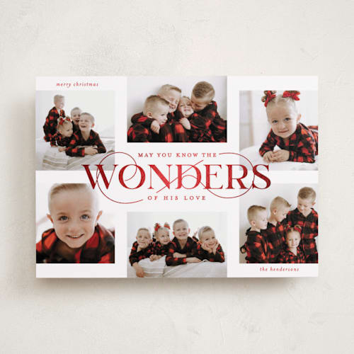 This is a ruby foil pressed holiday cards with foil pressed by Lauren Chism called glorious wonders printing on recycled smooth signature in standard