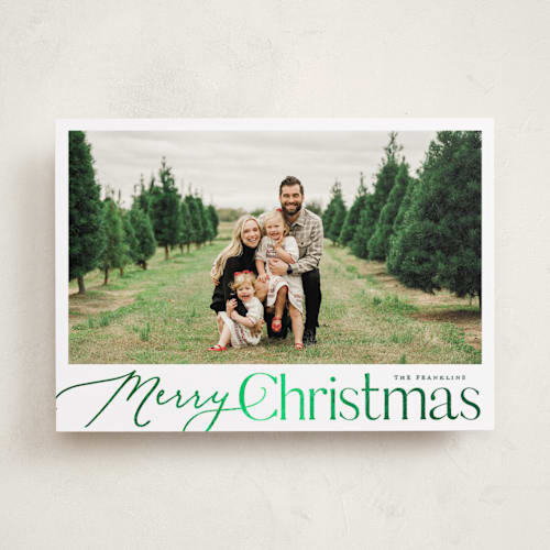 This is a evergreen foil pressed holiday cards with foil pressed by Carolyn MacLaren called merry mix printing on recycled smooth signature in standard