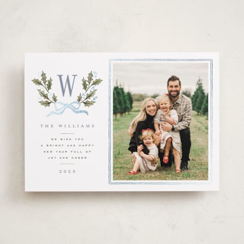 This is a blue spruce foil pressed holiday cards with foil pressed by Wildfield Paper Co called holly monogram printing on recycled smooth signature in standard