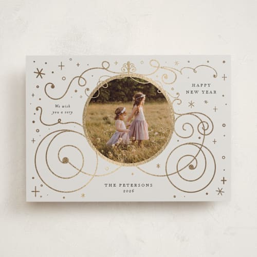 This is a ivory foil pressed holiday cards with foil pressed by Amy Payne called disney's cinderella carriage printing on recycled smooth signature in standard
