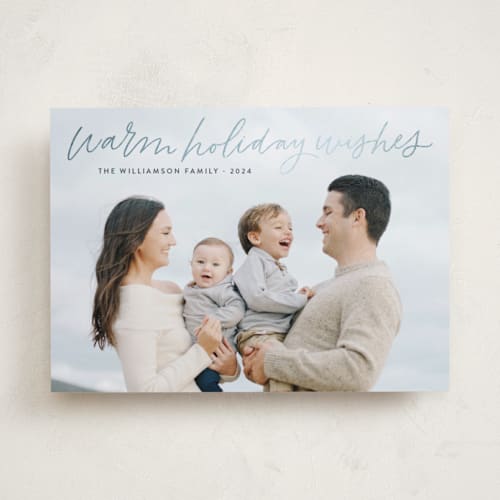 This is a midnight foil pressed holiday cards with foil pressed by Kristen Magee called warm holiday wishes script printing on recycled smooth signature in standard