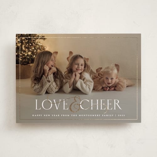 This is a snow foil pressed holiday cards with foil pressed by Meggy Masters called festive ampersand printing on recycled smooth signature in standard