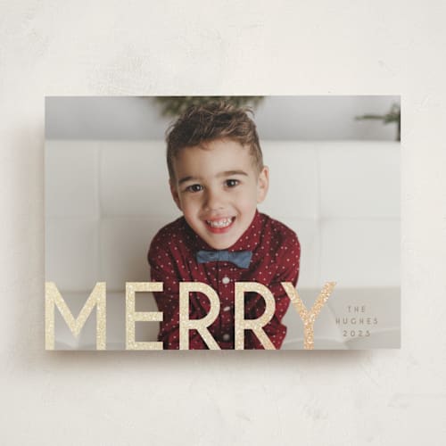 This is a vanilla foil pressed holiday cards with foil pressed by Snow and Ivy called bold type printing on recycled smooth signature in standard
