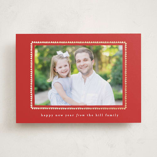 This is a holly foil pressed holiday cards with foil pressed by Sara Hicks Malone called hand drawn scallop printing on recycled smooth signature in standard