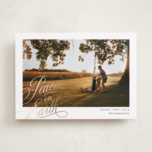 This is a snow foil pressed holiday cards with foil pressed by Yaling Hou Suzuki called peace delight printing on recycled smooth signature in standard