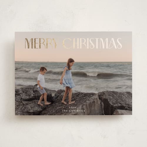 This is a cream foil pressed holiday cards with foil pressed by Ani Somi called sous le soleil printing on recycled smooth signature in standard