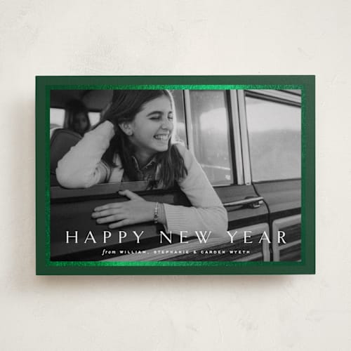 This is a pine foil pressed holiday cards with foil pressed by Amy Kross called winds printing on recycled smooth signature in standard