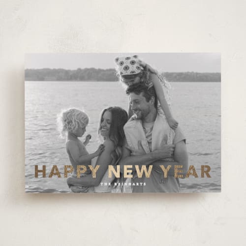 This is a linen foil pressed holiday cards with foil pressed by Angela Thompson called gilded printing on recycled smooth signature in standard