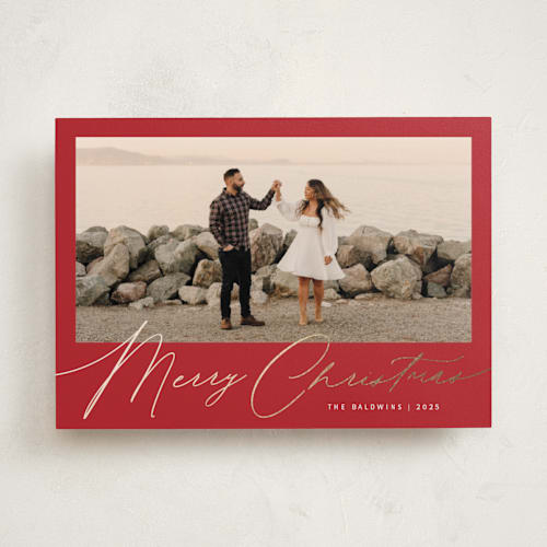 This is a crimson foil pressed holiday cards with foil pressed by Melanie Severin called simply charming printing on recycled smooth signature in standard