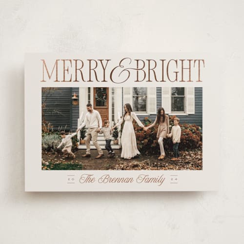 This is a cinnamon foil pressed holiday cards with foil pressed by Leah Bisch called merry headline printing on recycled smooth signature in standard