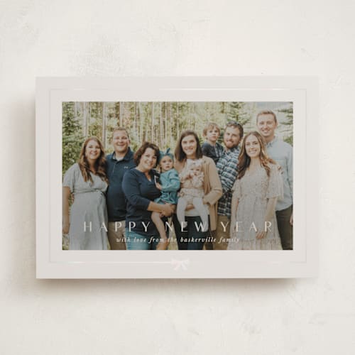 This is a cobblestone gloss press holiday cards with gloss press by Lori Wemple called pretty bow printing on recycled smooth signature in standard