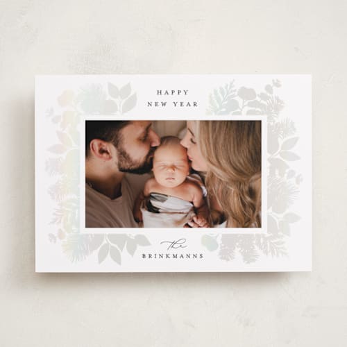 This is a snow gloss press holiday cards with gloss press by Brooke Chandler called joy greenery printing on recycled smooth signature in standard