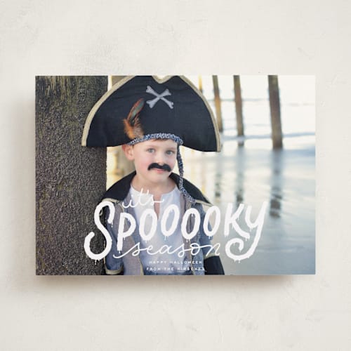 This is a ghostly halloween party invitations cards by Ashley DeMeyere called spooooky season printing on recycled smooth signature in standard