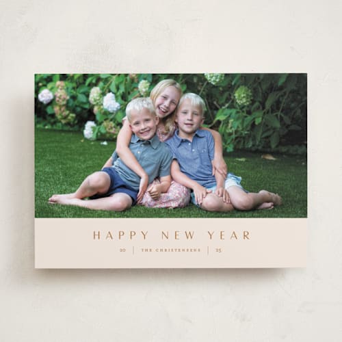 This is a buttercream new year photo cards with standard by Eric Clegg called understated printing on recycled smooth signature in standard