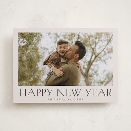 This is a parchment new year photo cards with standard by Nicole Walsh called headliner printing on recycled smooth signature in standard