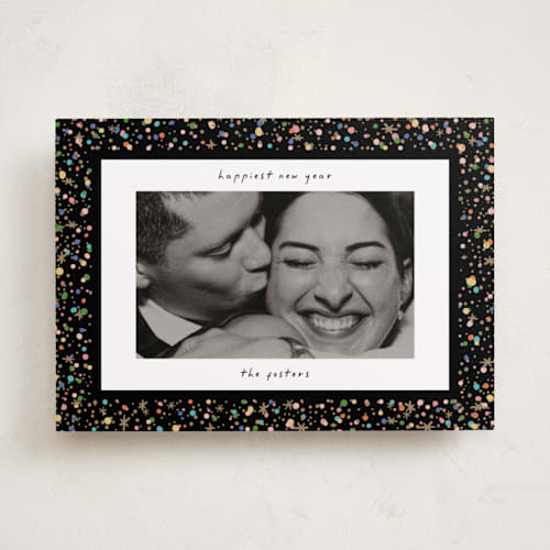 This is a popped new year photo cards with standard by Pixel and Hank called confetti and sparkle printing on recycled smooth signature in standard