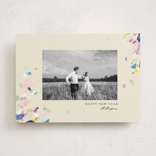 This is a eggnog new year photo cards with standard by Eric Ransom called dabbed confetti printing on recycled smooth signature in standard
