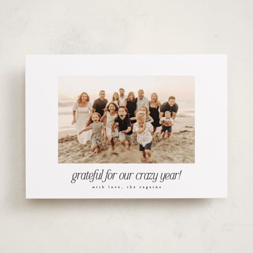 This is a pepper new year photo cards with standard by Leah Ragain called crazy year printing on recycled smooth signature in standard