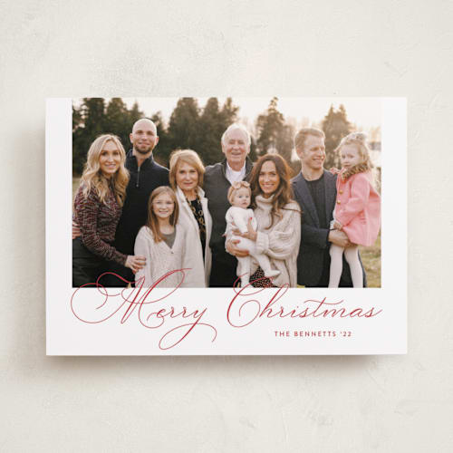 This is a poinsettia holiday photo cards with standard by Carolyn MacLaren called uptown script printing on recycled smooth signature in standard
