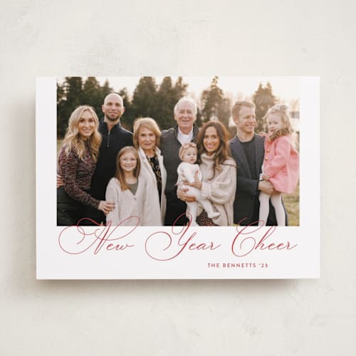 This is a poinsettia holiday photo cards with standard by Carolyn MacLaren called uptown script printing on recycled smooth signature in standard