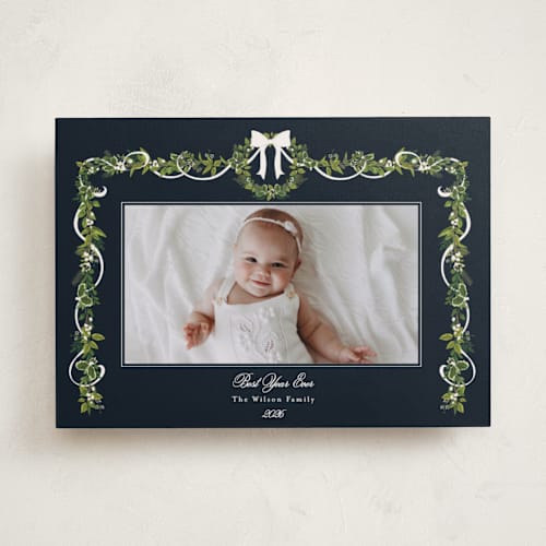 This is a glacier holiday photo cards with standard by Susan Moyal called bows & ribbon printing on recycled smooth signature in standard