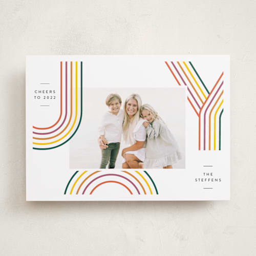 This is a jolly holiday photo cards with standard by Laura Bercovich called rainbow tidings printing on recycled smooth signature in standard