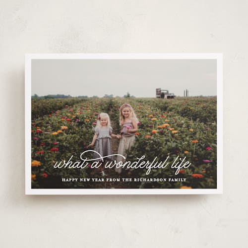 This is a snowflake holiday photo cards with standard by Leah Ragain called what a wonderful life printing on recycled smooth signature in standard