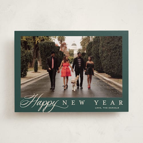 This is a wreath holiday photo cards with standard by Carolyn MacLaren called footnote printing on recycled smooth signature in standard