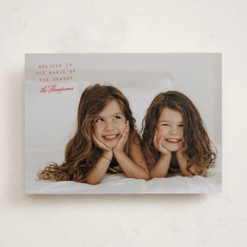 This is a cranberry holiday photo cards with standard by Heather Schertzer called believe printing on recycled smooth signature in standard
