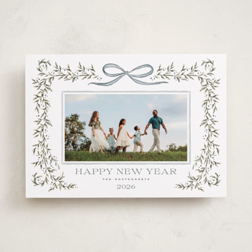 This is a juniper holiday photo cards with standard by Wildfield Paper Co called laurel wreath printing on recycled smooth signature in standard