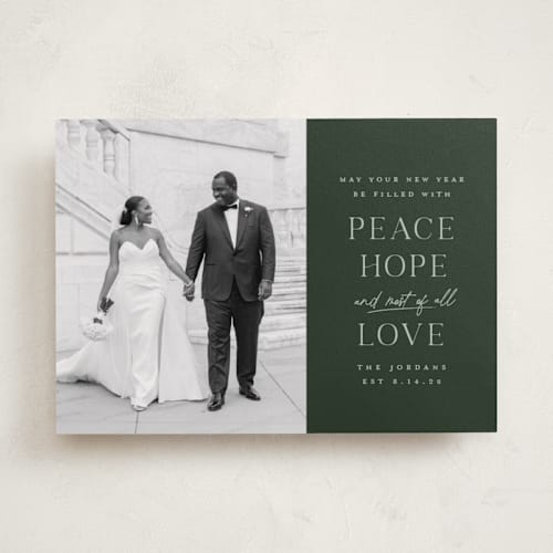 This is a pine holiday photo cards with standard by Heather Cairl called most of all printing on recycled smooth signature in standard