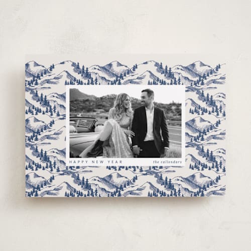This is a navy holiday photo cards with standard by Anna Black called hills and glens printing on recycled smooth signature in standard