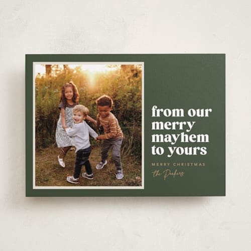 This is a pine holiday photo cards with standard by Robert and Stella called our merry mayhem printing on recycled smooth signature in standard