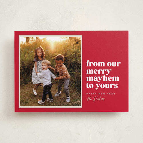This is a holly berry holiday photo cards with standard by Robert and Stella called our merry mayhem printing on recycled smooth signature in standard
