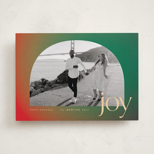 This is a pomegranate kwanzaa cards with standard by Robin Ott called nordic lights printing on recycled smooth signature in standard