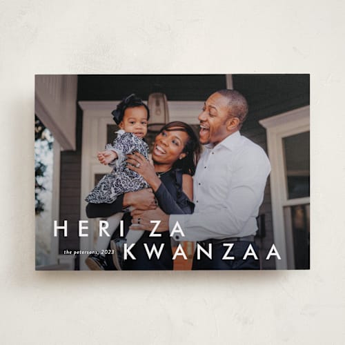This is a cotton kwanzaa cards with standard by Stacey Meacham called happy moments printing on recycled smooth signature in standard