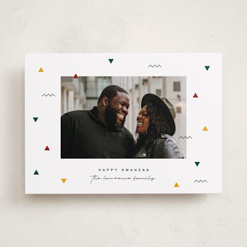 This is a snow kwanzaa cards with standard by Jessica Corliss called kwanzaa confetti printing on recycled smooth signature in standard